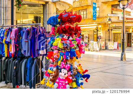 colorful souvenirs hanging on the street 120176994