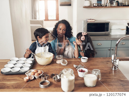 Whatever you call it, whoever you are, you need family. Shot of a woman baking at home with her children. Whatever you call it, whoever you are, you need family. Shot of a woman baking at home with her children. 120177074