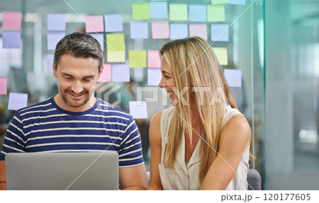 We make a great team. Two coworkers impressed by their collaboration at work. We make a great team. Two coworkers impressed by their collaboration at work. 120177605