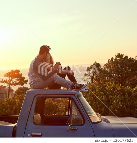 Let love lead the way through new adventures. Shot of an affectionate young couple enjoying a roadtrip together. Let love lead the way through new adventures. Shot of an affectionate young couple enjoying a roadtrip together. 120177623