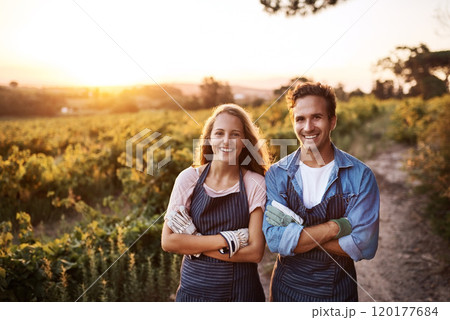 We have access to fresh produce all year long. Portrait of a confident young man and woman working together on a farm. 120177684