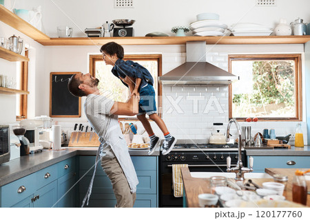 My son is the reason for my happiness. Shot of a man spending quality time at home with his young son. 120177760