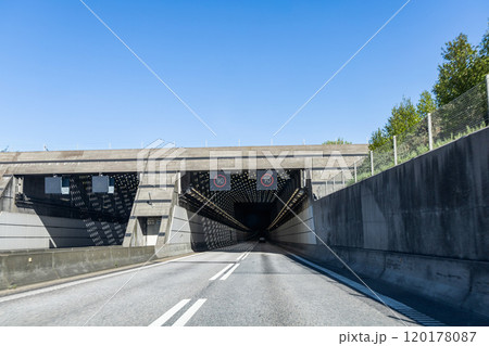 High-speed road tunnel view from a fast-moving car. 120178087