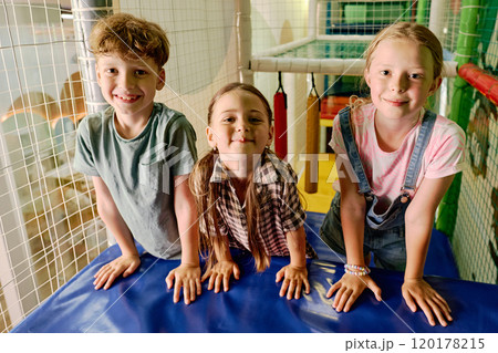 Adorable friendly kids on facilities 120178215