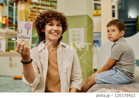 Teaching kids English alphabet at lesson 120178422