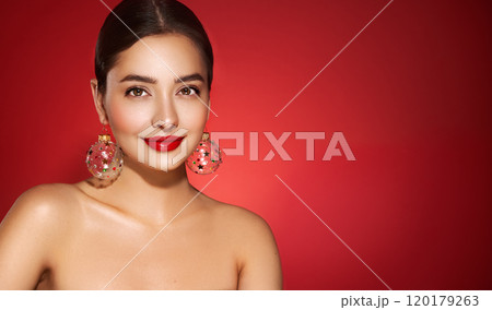 Portrait of beautiful young woman on red background Portrait of beautiful young woman on red background 120179263