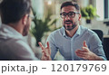 Professional man explaining ideas during a discussion with a colleague 120179769