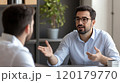 Businessman passionately explaining his ideas during a discussion at the office 120179770