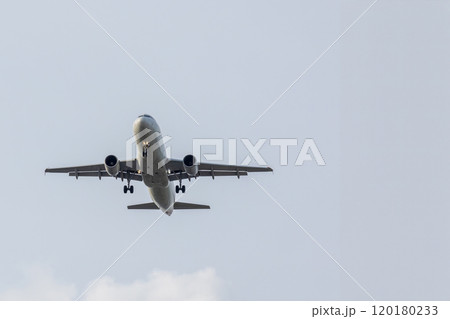 Airplane and sky, the plane is landing. Airplane take off on the blue sky, Aircraft flying on sky background. Passenger plane ready for landing. Low angle view of Airplane flying under blue sky Airplane and sky, the plane is landing. Airplane take off on the blue sky, Aircraft flying on sky background. Passenger plane ready for landing. Low angle view of Airplane flying under blue sky 120180233