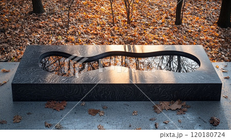 contemporary aluminum memorial pet displayed featuring abstract designs and empty plaque emphasizes modern artistry and refined simplicity 120180724