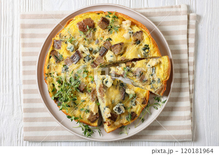 omelette with blue cheese, rye croutons and thyme 120181964
