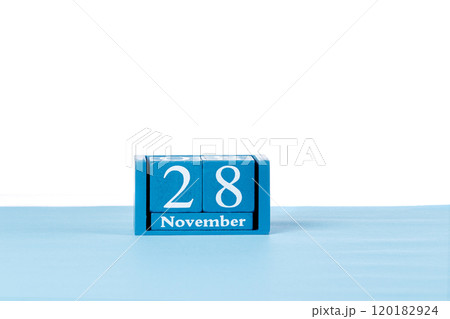 Wooden calendar November 28 on a white background Wooden calendar November 28 on a white background 120182924