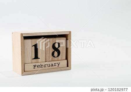Wooden calendar February 18 on a white background 120182977