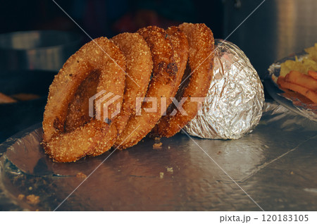 Sel roti which is a ring-shaped sweet fried dough made from rice flour. An authentic nepali local delicacy prepared during Dashain and Tihar hindu festival in Nepal 120183105