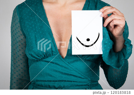 Women's breast health, beauty and well-being. Woman in green dress 120183818