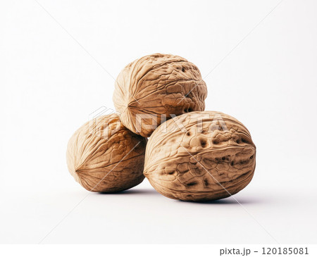 Three Whole Walnuts Stacked on White Background Three Whole Walnuts Stacked on White Background 120185081