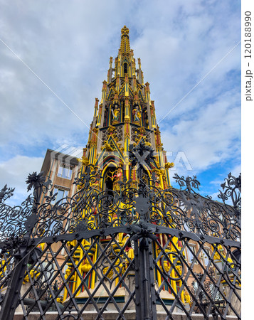 Schoner Brunnen ancient fountain and Frauenkirche Church at Hauptmarkt main square 120188990