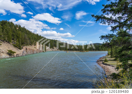 Canadian Rockies Jasper National Park landscape background. Athabasca River in summer. Alberta, Canada. 120189480