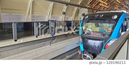 Light Rail Transit or LRT or rail transport system in Indonesia, modern metro train stationed at an urban platform, showcasing efficient public transport 120190211