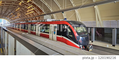 Light Rail Transit or LRT or rail transport system in Indonesia, modern metro train stationed at an urban platform, showcasing efficient public transport Light Rail Transit or LRT or rail transport system in Indonesia, modern metro train stationed at an urban platform, showcasing efficient public transport 120190216
