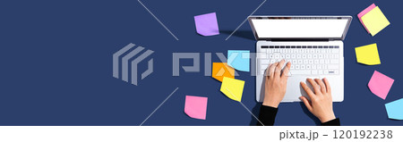 Laptop computer with many sticky notes Laptop computer with many sticky notes 120192238