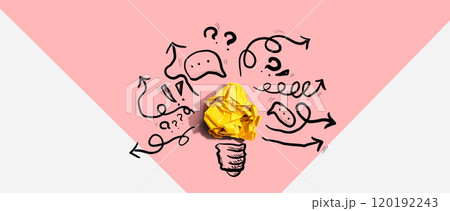 Brainstorming concept with a crumpled paper light bulb 120192243