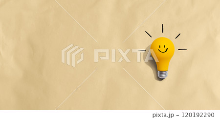 Yellow light bulb with happy face Yellow light bulb with happy face 120192290