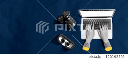Laptop computer with a SLR camera and VR 120192291