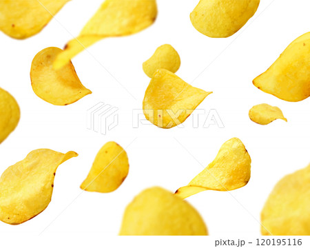 Crunchy salty fried or baked potato chip flying 120195116