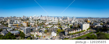 Aerial view of San Francisco's skyline featuring the Transamerica Pyramid and Painted Ladies, showcasing diverse architecture under a clear blue sky. Aerial view of San Francisco's skyline featuring the Transamerica Pyramid and Painted Ladies, showcasing diverse architecture under a clear blue sky. 120195835