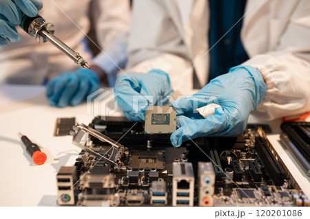 Close up of Technician measuring voltage electronic circuit board, Service after sale fix electric equipment. 120201086