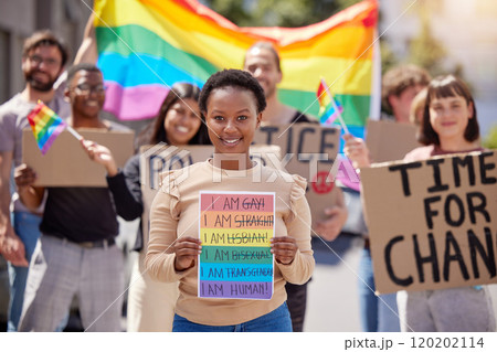 We are all human. Shot of a group of young people protesting for lgbtq rights. 120202114