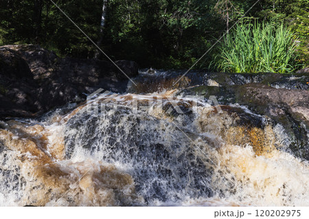 Waterfall of Ruskeala on a summer day, natural photo 120202975
