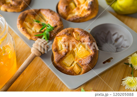 cooked cottage cheese muffins with quince and honey 120205088
