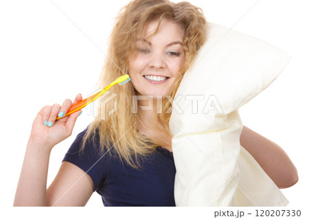 Sleepy happy woman hugging white pillow 120207330