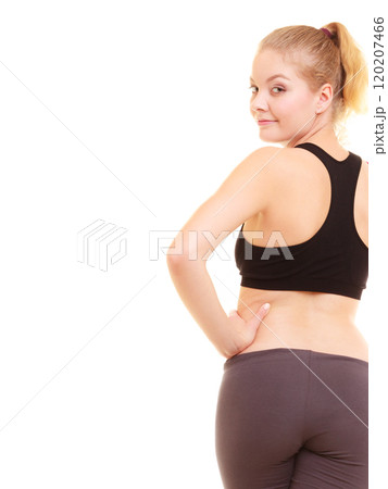 Sport. Back of fitness sporty girl in sportswear isolated 120207466