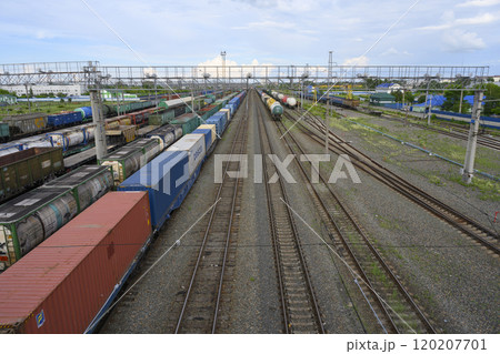 Rails at the railway station and freight cars 120207701