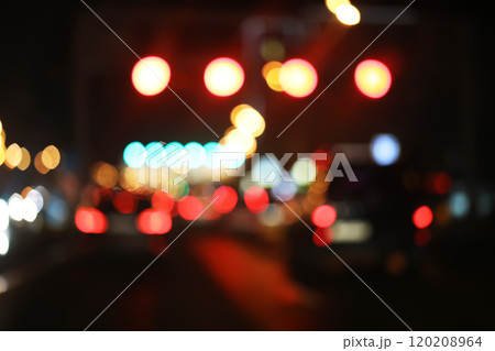 De focused/blur image of city at night. De focused, blurred urban abstract traffic background. 120208964