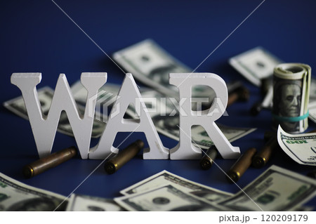 WAR, word written in wooden alphabet letters on blue background. The concept of a terrible war destroying country. 120209179