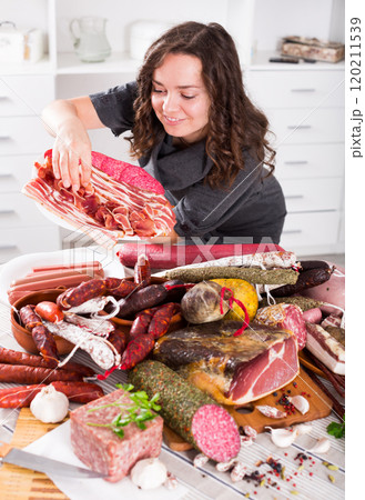 Girl with jamon and sausage 120211539