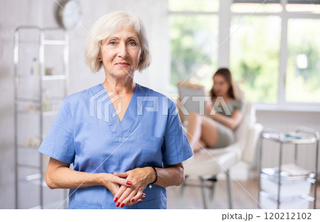 Elderly female doctor portrait Elderly female doctor portrait 120212102