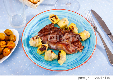 Grilled veal steak with artichokes, healthy dinner 120215140