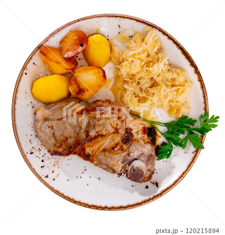 Grilled pork with potatoes and sauerkraut Grilled pork with potatoes and sauerkraut 120215894