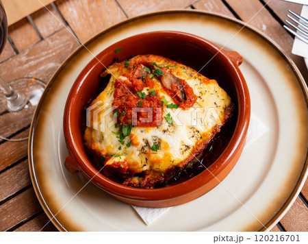 Eggplant and tomatoes served with parmesan 120216701
