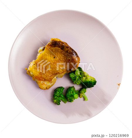 Fried chicken pieces served with broccoli 120216969
