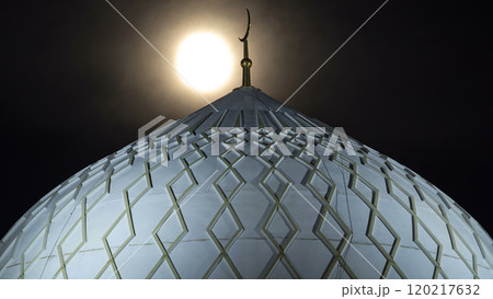 Dome of The Hazrat Sultan Mosque in Astana timelapse at night with full moon, Kazakhstan 120217632