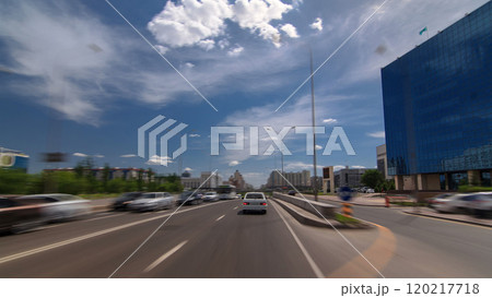 Car drives on street Traffic over the wide boulevards of Astana timelapse hyperlapse drivelapse in Kazakhstan 120217718