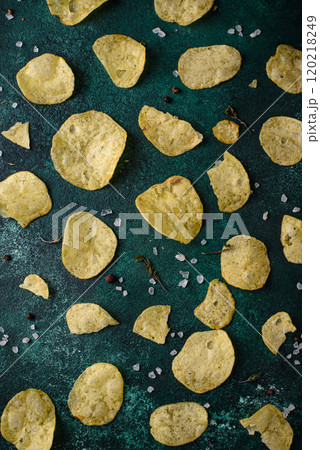 Crispy salty homemade potato chips 120218249