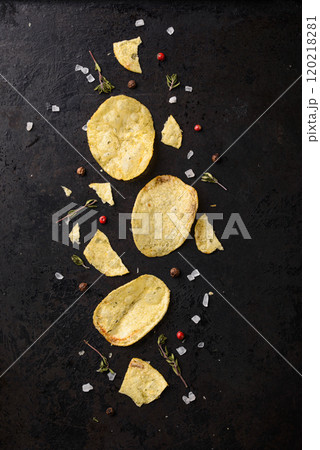 Crispy salty homemade potato chips 120218281
