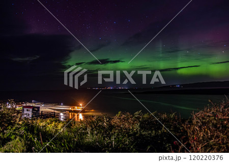 The Aurora Borealis, the northern lights, showing up in Portnoo, County Donegal, Ireland. The Aurora Borealis, the northern lights, showing up in Portnoo, County Donegal, Ireland. 120220376
